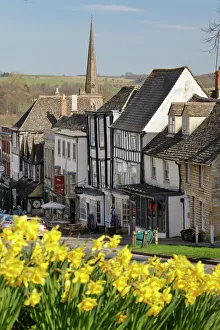 Burford Prints: High Street and Burford Church with daffodils, Burford, Cotswolds, Oxfordshire, England