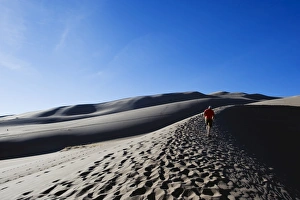 View From Behind Prints: Hiker at Great Sand Dunes National Park, Colorado, United States of America