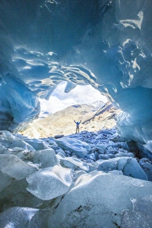 Barren Prints: Hiker inside Forni Glacier, Forni Valley, Stelvio National Park, Valtellina, Lombardy