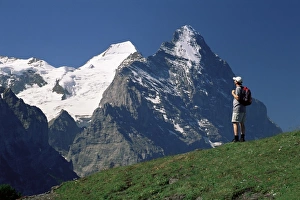 Bern Prints: Hiker looking to the snow-covered Monch and the north