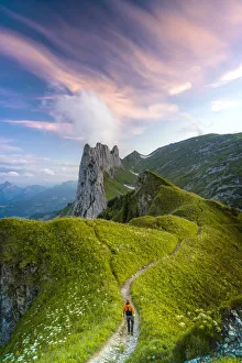 Mature Men Prints: Hiker man walking on footpath towards Saxer Lucke at sunset, Appenzell Canton