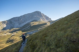 Abruzzo Prints: Hiker on the path to the summit of peak Corno Grande