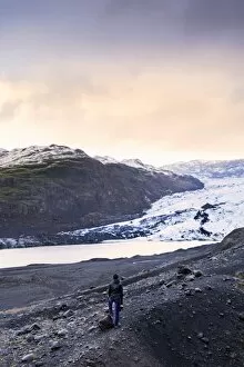 Contemplation Gallery: Hiker in front of the Vatnajokull glacier in Vatnajokull National Park in southeast Iceland