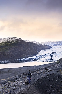 Contemplation Gallery: Hiker in front of the Vatnajokull glacier in Vatnajokull National Park in southeast Iceland