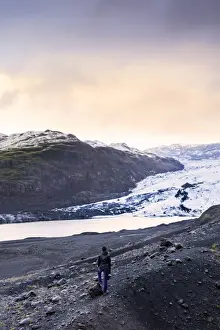 Thoughtful Prints: Hiker in front of the Vatnajokull glacier in Vatnajokull National Park in southeast Iceland