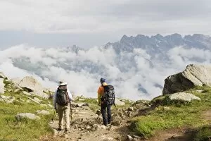 Hikers above Chamonix Valley, Rhone Alps, France, Europe
