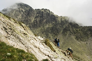 Climber Prints: Hikers on difficult trail