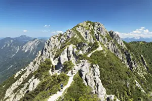Hikers on Gratweg Trail from Heimgarten to Herzogstand Mountain, Upper Bavaria, Bavaria