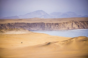 Unrecognisable Person Prints: Hikers hiking in desert and sand dunes
