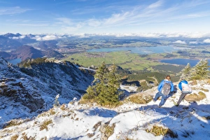 Weekend Activities Prints: Hikers on steep crest covered with snow in the Ammergau Alps, Tegelberg, Fussen, Bavaria