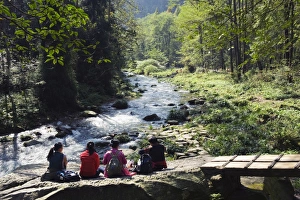 Enjoying Prints: Hikers taking a break near a river, Zhangjiajie Forest Park, Wulingyuan Scenic Area