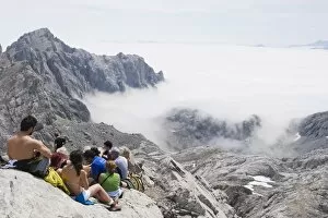 Images Dated 8th August 2009: Hikers taking a break on Tesorero Peak, in Picos de Europa National Park
