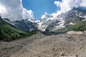 Outdoor Exploration Prints: Hiking trail in alpine landscape facing Monte Rosa with moraine landscape