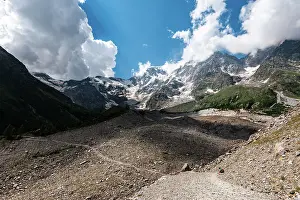 Fitness Prints: Hiking trail in alpine landscape facing Monte Rosa with moraine landscape