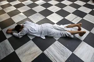 Indigenous Culture Prints: Hindu devotee prostrating at Krishna-Balaram temple, Vrindavan, Uttar Pradesh, India