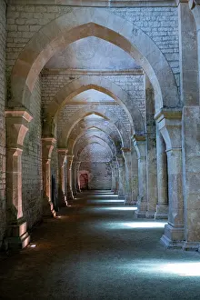 Columns Prints: Historic architecture of the Abbey of Fontenay featuring arches and stone walls in France