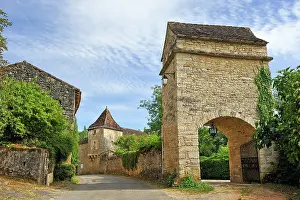Cobblestone Prints: Historic architecture and pathways in the village of Lherm