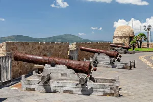 Fortified Wall Prints: Historic cannons on the town wall of Alghero