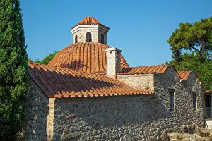 Touristic Prints: Historic Dervish Lodge Museum displays traditional architecture and roofing in Antalya