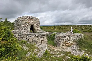 Grassland Prints: Historic dry-stone hut known as Capitelle in Southern Cevennes of France