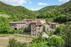 Gard Prints: Historic hamlet of Larboux in the Cevennes range showcases traditional stone buildings and natural scenery in France