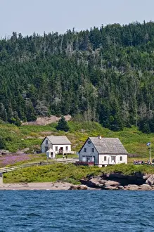 Quebec Prints: Historic settlement on Ile Bonaventure offshore of Perce, Quebec, Canada, North America