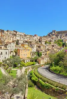 Small Prints: Historic view of Ragusa Ibla showing landscape and buildings in Sicily Italy on a sunny day with blue sky