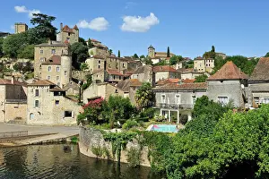 Riverside Prints: Historic village on the riverside in Puy lEveque