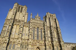 The historic western facade of Wells Cathedral, with its twin square towers, in Wells