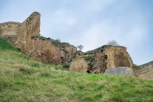 Fortifications Prints: Historical ruins of Naryn-Kala fortress stand on a hillside in Dagestan