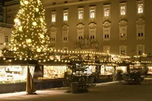 Images Dated 18th December 2007: Historical Salzburg Christkindlmarkt (Christmas market) with stalls and Rezidens building at night