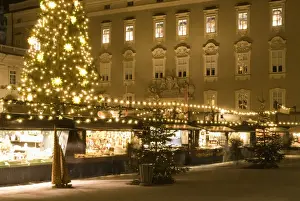 Christkindlmarkt Prints: Historical Salzburg Christkindlmarkt (Christmas market) with stalls and Rezidens building at night