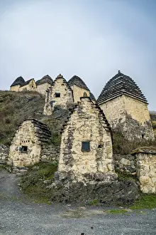 Settlement Prints: Historical structures in Dargavs showcasing unique architecture in Caucasus region of North Ossetia