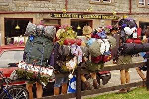 Carrying Prints: Hitch hiking backpackers