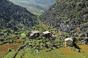 Farmers Prints: Hmong houses nestled in limestone mountains in Dong Van Karst Plateau Geopark