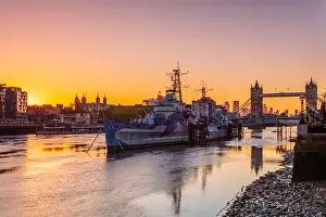 Connection Prints: HMS Belfast and Tower Bridge at sunrise with a low tide on the River Thames, London