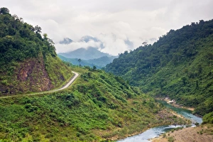 Ho Chi Minh Highway West passing through jungle landscape, Quang Ninh District, Quang Binh Province
