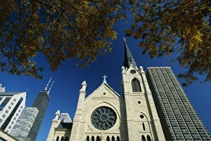 Holy Name Christian cathedral and tower blocks of