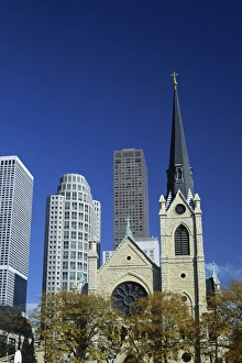 Holy Name Christian cathedral and tower blocks of