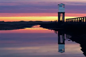Silhouetted Gallery: Holy Island Causeway at sunrise, Lindisfarne, Northumberland, England, United Kingdom