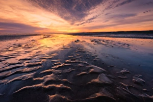 Holy Island Causeway at sunrise, Lindisfarne, Northumberland, England, United Kingdom