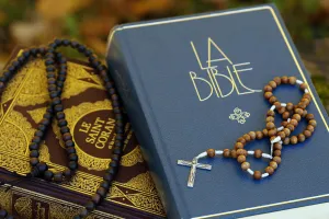 Rosary Prints: Holy Quran in French with Muslim prayer beads and Bible with rosary