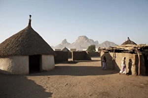 Sudan Prints: Homes lie in the shadow of Taka Mountain in the town of Kassala