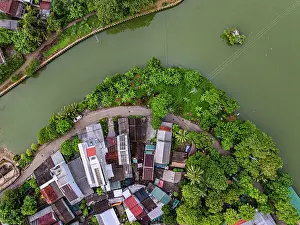Small Prints: Homes along the riverbank in Hue