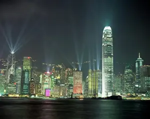 Illumination Prints: Hong Kong city skyline looking across Victoria harbour to Hong Kong Island at night