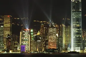 Glass Prints: Hong Kong Island Central skyline at night from Tsim Sha Tsui, Hong Kong, China, Asia