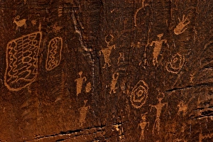 Horned anthropomorphs holding shields, Formative Period Petroglyphs, Utah Scenic Byway 279, Potash Road, Moab, Utah, United States of America, North America