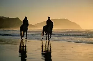 Togetherness Gallery: Horse riding on the beach at sunrise