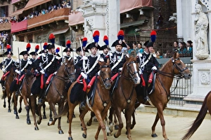 Images Dated 16th August 2010: Horses and guards parading at El Palio horse race festival, Piazza del Campo