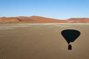 Hot Air Balloon Prints: Hot air balloon shadow on desert, Namib Naukluft Park, Namib Desert, Namibia, Africa